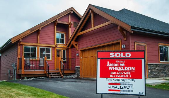 For sale sign on Cranbrook home.