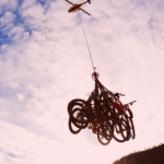 Pedal bikes being transported by helicopter