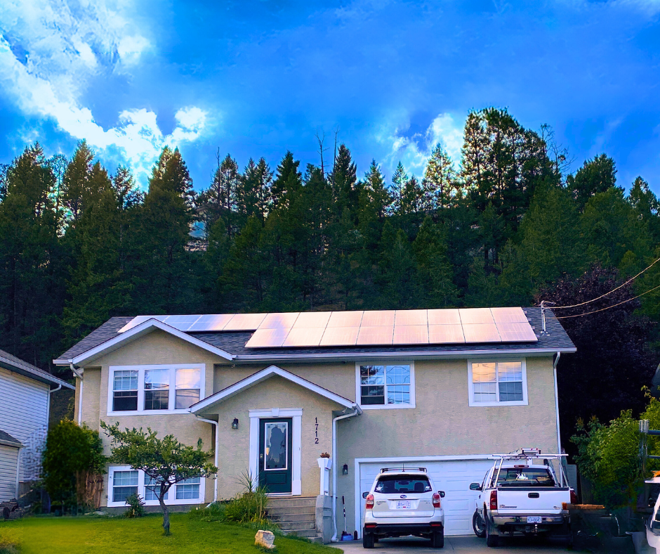 Alberta home with rooftop solar panels installed as part of a residential clean energy upgrade eligible for available rebate programs